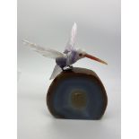 CARVED AMETHYST HUMMING BIRD SET ON AGATE