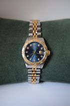 ROLEX DATEJUST 26MM LADIES 18K/ STEEL WITH FACTORY BLUE DIAMOND DIAL & UNUSUAL DIAMOND BARK BEZEL