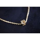 18K GOLD GUCCI BRACELET WITH FIXED GUCCI CUBE CHARM