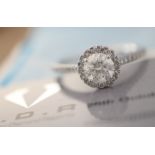 1.11CT DIAMOND RING - ROUND BRILLIANT CUT HALO