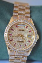 ROLEX DAY DATE 18K REF. 18038 DIAMOND-SET WITH RUBIES (BAGUETTES) - QUICK-SETTING
