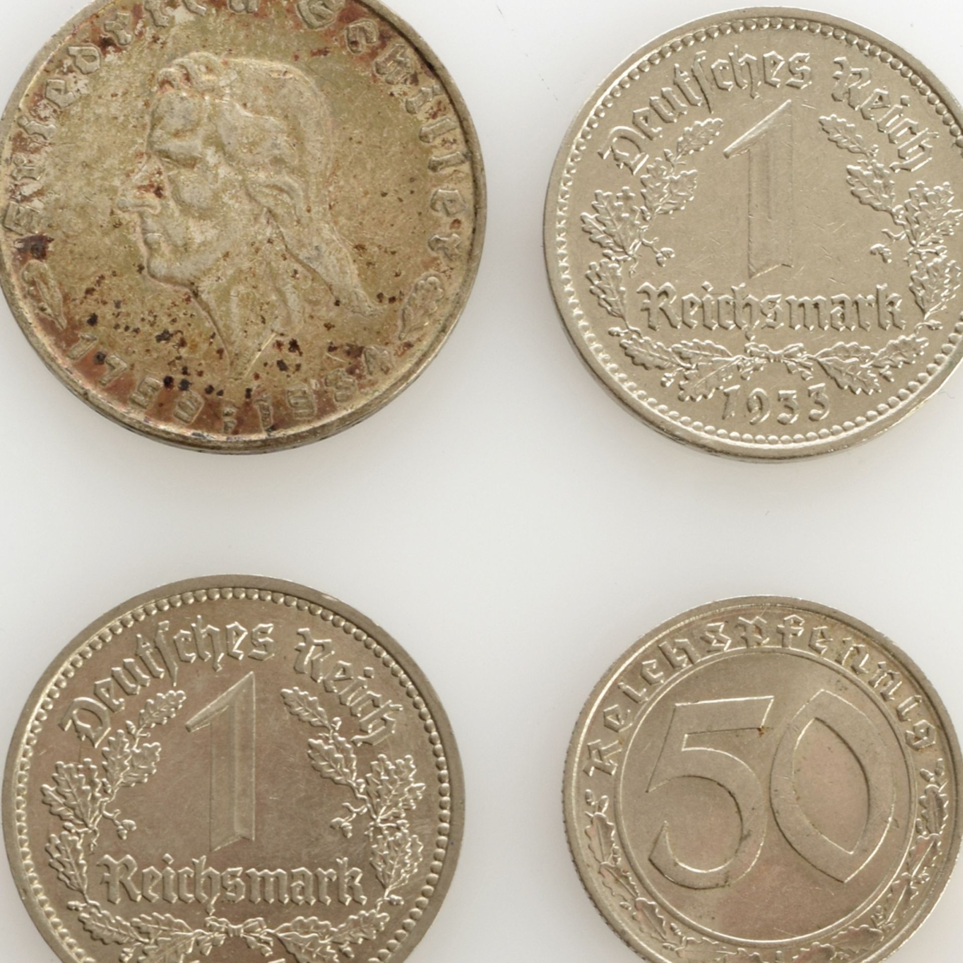 Vier Münzen 1930er Jahre