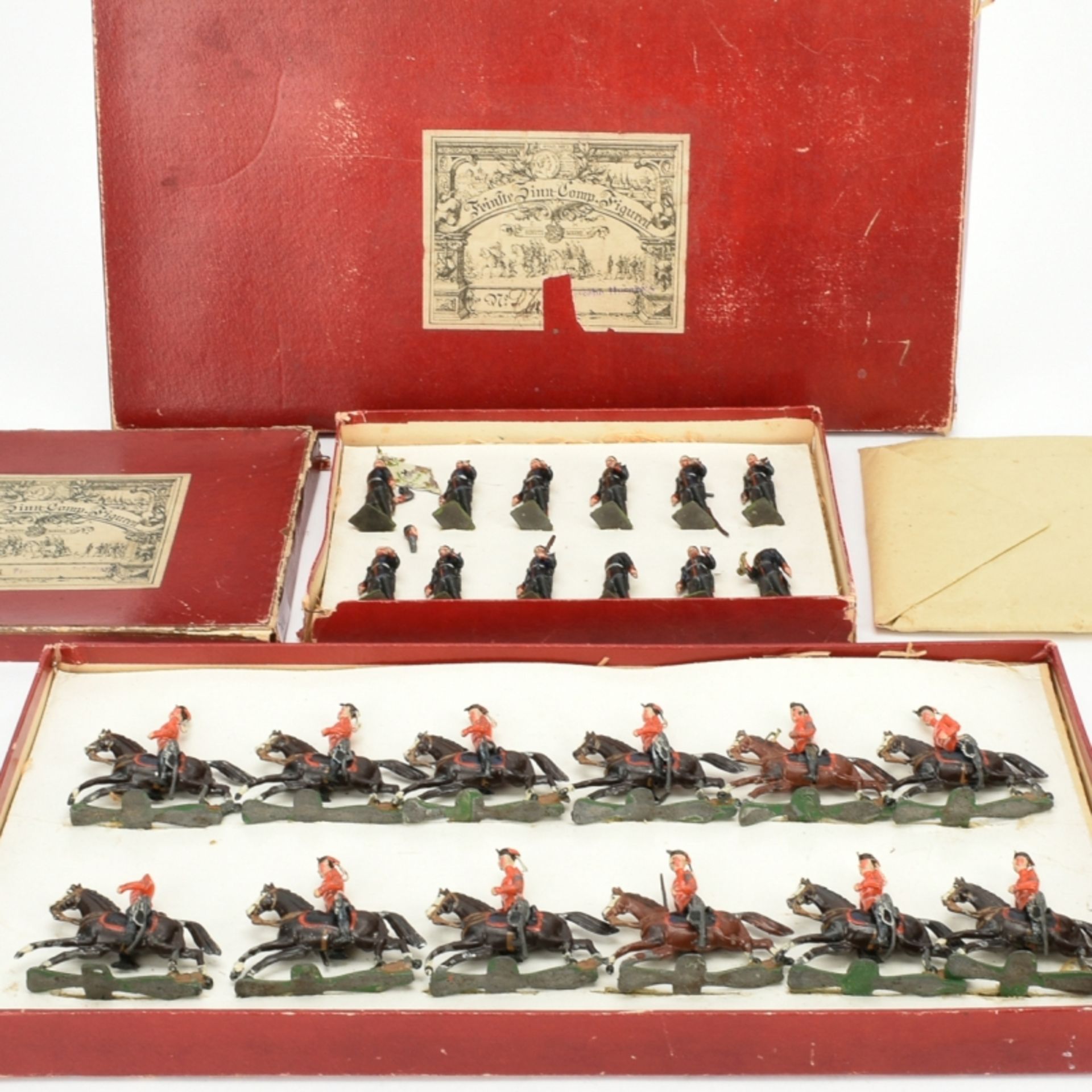 Zwei Originalkartons mit Heinrichsen-Zinnfiguren