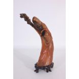 Finely Carved Horn Depicting a Figure of Lohan