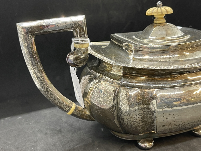 Hallmarked Silver: Teapot, reed pattern with gadroon border on four ball feet, hallmarked Chester. - Image 2 of 3