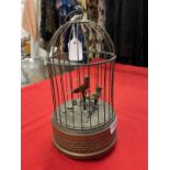 19th/early 20th cent. Continental bird automaton, brass cage, two songbirds on branch with