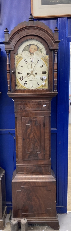 Clocks: Mid 19th cent. Short door mahogany longcase with break arch fretted top surmounted by turned