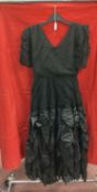 1920s/30s Fashion: Black cocktail dress, crepe bodice, V neck front and back, short sleeves, the