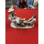 20th cent. Ceramics: Lladro figurine Seesaw Friends 6169, boy and girl with older girl on seesaw