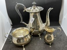 Hallmarked Silver: Three piece coffee set with scalloped border on three splayed feet, coffee pot