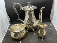 Hallmarked Silver: Three piece coffee set with scalloped border on three splayed feet, coffee pot