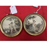 19th cent. English School: Pair of miniatures woman and children painted on silk in round brass