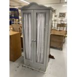 20th cent. Painted pine storage cupboard, three shelves over a single drawer.