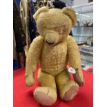 Toys: Chad Valley teddy bear, jointed, eyes missing, repair to one pad. Approx. 27ins.