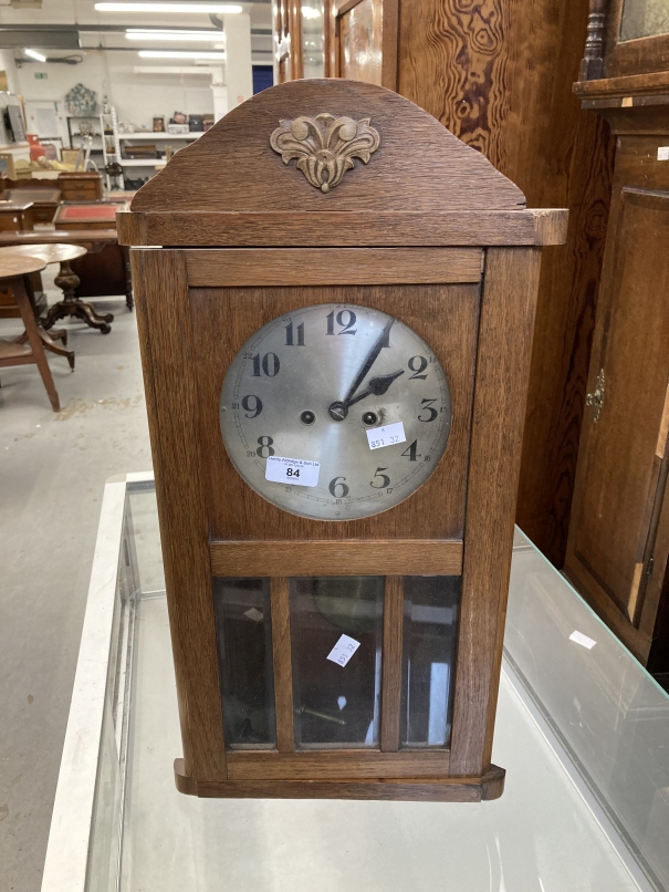 Clocks: Early 20th cent. French Empire green onyx mantel clock with applied brass decoration. French