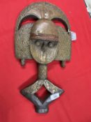 Tribal Art: Mask with copper panels.