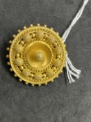 Jewellery: Yellow metal Victorian circular Tuscan style brooch with shot and wire work decoration,