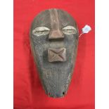 Tribal Art: Songye mask.