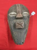 Tribal Art: Songye mask.