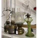 Lighting: Brass oil lamp with a wavy edged Vaseline glass top, a green glass lamp with spiral