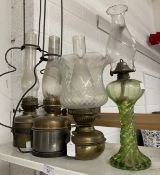 Lighting: Brass oil lamp with a wavy edged Vaseline glass top, a green glass lamp with spiral