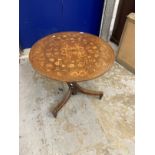 Early 19th cent. Marquetry tilt top table possibly Dutch, the circular top inlaid with flowers, etc.