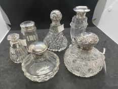 Hallmarked Silver: Glass scent bottles, cut glass bottle with silver top London, Mappin & Webb 1909.