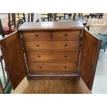 19th cent. Mahogany collectors cabinet, two arched doors opening to reveal two short over three long