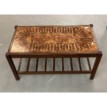 1970s teak coffee table the top with eight inset pottery tiles, square legs joined by a slat work