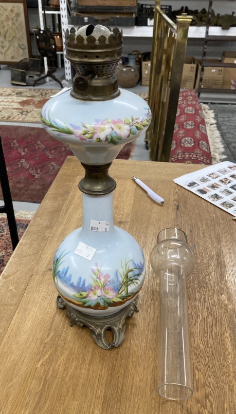 Lighting: Late 19th cent. Opaline glass oil lamp painted with a stork on a brass base.