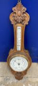 Edwardian oak cased aneroid barometer, mercury thermometer, unsigned. 36ins. x 12ins.