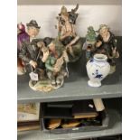 20th cent. Capodimonte figure groups, a tramp on a bench, two musicians and an angler at rest,