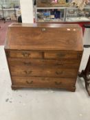 19th cent. Mahogany bureau with three long and two short drawers, fitted interior. 42ins. x 21ins. x