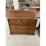 19th cent. Mahogany bureau with three long and two short drawers, fitted interior. 42ins. x 21ins. x