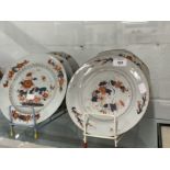 Chinese Porcelain: Late 18th/early 19th cent. Imari pattern plates, a pair of shaped plates