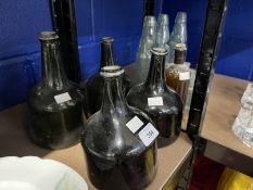 Glass: 18th cent. Four mallet shaped wine bottles all with sloping shoulders, two with small chips