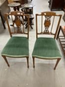 Edwardian bedroom chairs the backs with central roundel inlaid with flowers, upholstered seats on