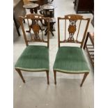 Edwardian bedroom chairs the backs with central roundel inlaid with flowers, upholstered seats on