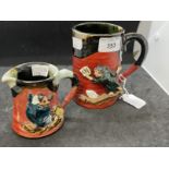 19th/20th cent. Japanese Sumida pottery mug with a boy climbing rocks, 5ins. Jug with a raised