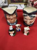 20th cent. Ceramics: Two large Royal Doulton character jugs 'Grammy' and 'Parson Brown' plus three