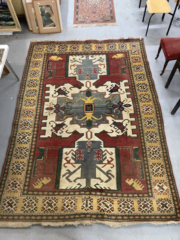 Carpets & Rugs: 20th cent. Kazak style Turkish made carpet, red ground with three medallions,