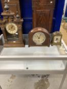 Clocks: Group of three to include 20th cent. German oak cased mantel clock surmounted by turned