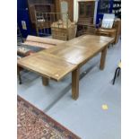 20th cent. Oak draw leaf extending dining table with single drawer. 94½ins. x 36ins. Extended.