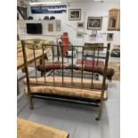 Early 20th cent. Brass framed double bed on castors. 6ft. 6ins. x 4ft. 6ins.