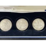 Numismatics: 1935 George V St George and Dragon Crowns. Very good uncirculated condition. (3)