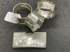 Hallmarked Silver: Card case Birmingham 1902 and three silver napkin rings. 2.6ozt.