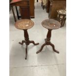 Late 19th cent. Mahogany plant stands, circular tops on turned columns with a tripod base, a pair.