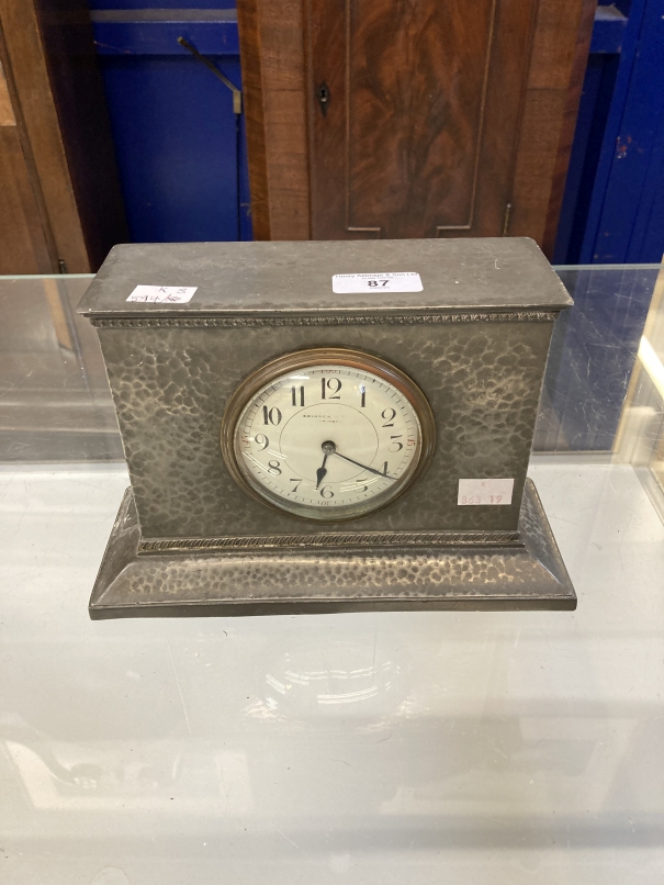 Clocks: Liberty & Co planished pewter mantel clock, impressed base English Pewter Made by