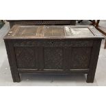 Early 18th cent. Carved oak coffer with hinged rectangular lid, three panel front with diamond