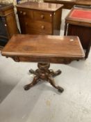 19th cent. Mahogany games table on single column and four scrolled supports. 36ins. x 28ins. x